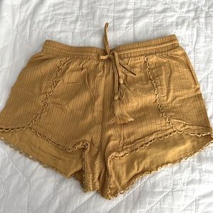 Yellow high waisted pull on shorts